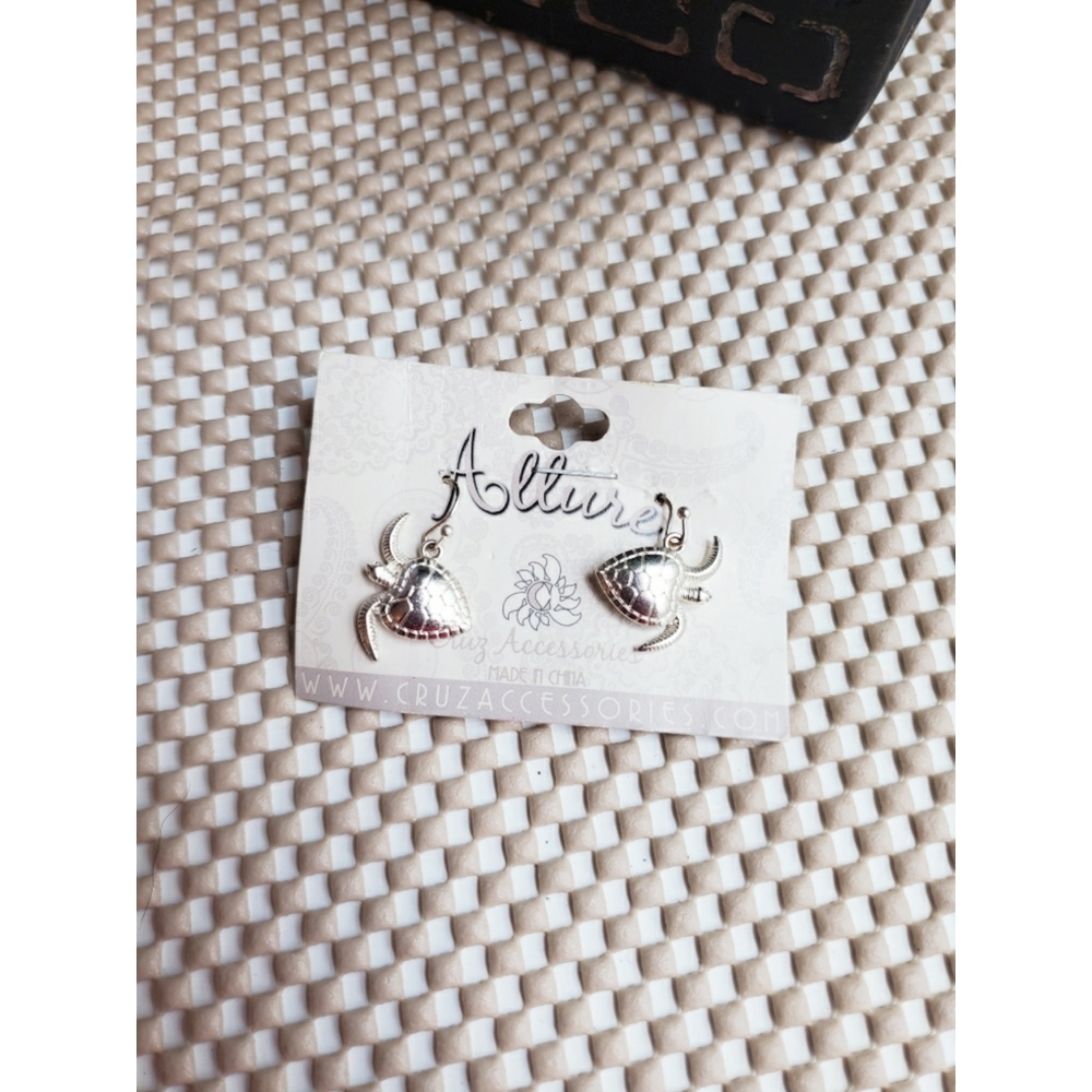 Silver colored turtle earrings